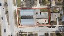 Rare opportunity to acquire a 9-unit complex with 6 fully rented units already constructed. The property features two 1,700 sq ft triplex buildings with oversized attached heated garages, plus a p... - 210 Main Street, Selkirk, MB  -  