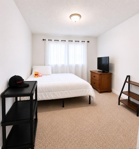 #205-7450 Rupert St, Port Hardy, BC - Indoor Photo Showing Bedroom