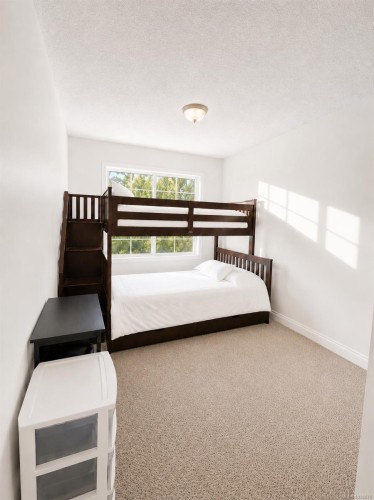 #205-7450 Rupert St, Port Hardy, BC - Indoor Photo Showing Bedroom