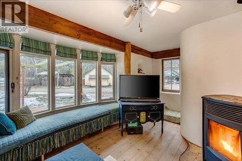 Main house living room - 3918 Passmore Upper Road, Passmore, BC - Indoor With Fireplace