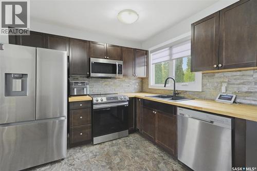 31 Bence Crescent, Saskatoon, SK - Indoor Photo Showing Kitchen With Double Sink
