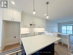 Kitchen w/ Quartz Counters - 