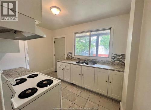 3458 Harris, Windsor, ON - Indoor Photo Showing Kitchen With Double Sink