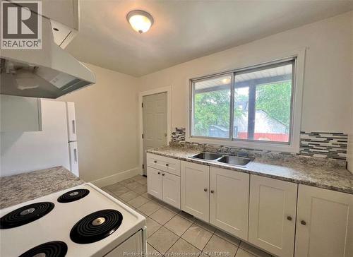 3458 Harris, Windsor, ON - Indoor Photo Showing Kitchen With Double Sink