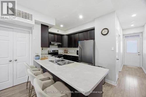 56 - 180 Howden Boulevard, Brampton, ON - Indoor Photo Showing Kitchen With Double Sink