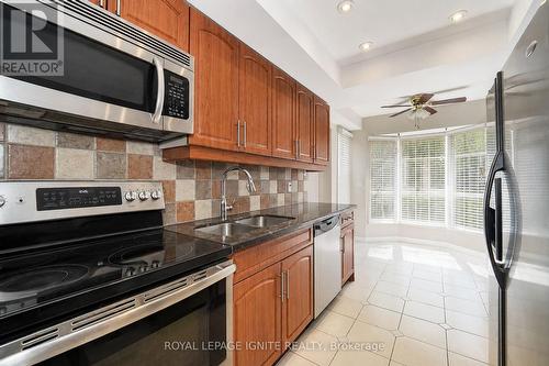 21 Halfmoon Square, Toronto, ON - Indoor Photo Showing Kitchen With Stainless Steel Kitchen With Double Sink