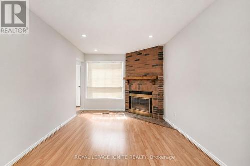 furniture virtually removed - 21 Halfmoon Square, Toronto, ON - Indoor With Fireplace