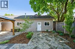 Exterior building with tan horizontal siding - 