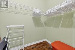 Sizeable primary walk in closet - 