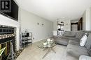 6427 Rochdale Boulevard, Regina, SK  - Indoor Photo Showing Living Room With Fireplace 