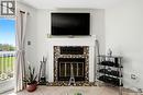 6427 Rochdale Boulevard, Regina, SK  - Indoor Photo Showing Other Room With Fireplace 