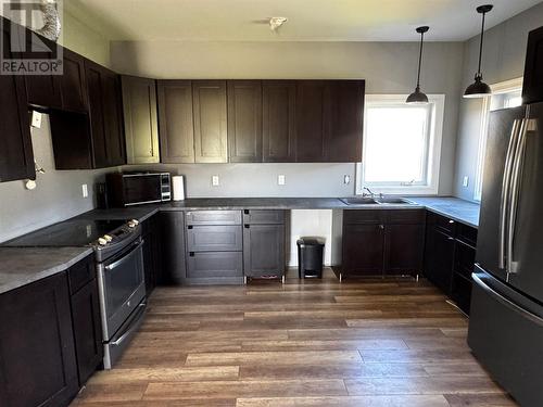25-27 Main Street S, Rocky Harbour, NL - Indoor Photo Showing Kitchen With Double Sink