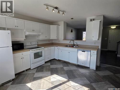 2195 Toronto Street, Regina, SK - Indoor Photo Showing Kitchen With Double Sink