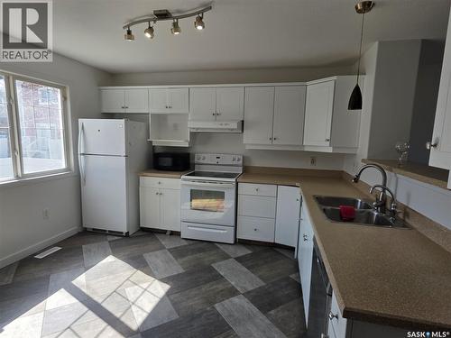 2195 Toronto Street, Regina, SK - Indoor Photo Showing Kitchen With Double Sink