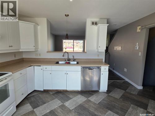 2195 Toronto Street, Regina, SK - Indoor Photo Showing Kitchen With Double Sink