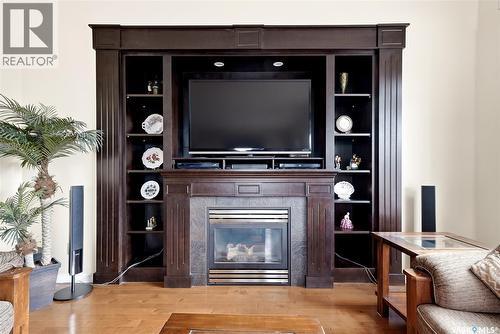 2534 Windsor Park Road, Regina, SK - Indoor Photo Showing Living Room With Fireplace