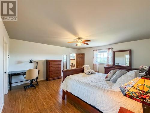 Primate Bedroom with ensuite and walk-in closet - 244 Main Street, Burin Bay Arm, NL - Indoor Photo Showing Bedroom