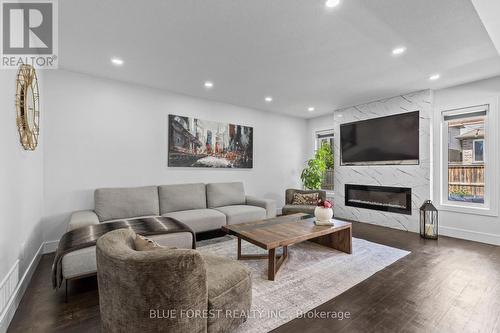 3293 Casson Way, London South (South W), ON - Indoor Photo Showing Living Room With Fireplace