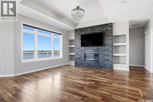 701 Saskatoon Drive, Katepwa Beach, SK - Indoor Photo Showing Living Room With Fireplace