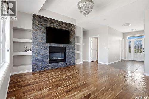 701 Saskatoon Drive, Katepwa Beach, SK - Indoor Photo Showing Living Room With Fireplace