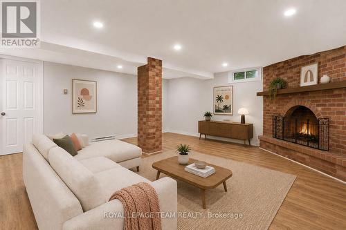 2317 Elmira Drive, Ottawa, ON - Indoor Photo Showing Living Room With Fireplace