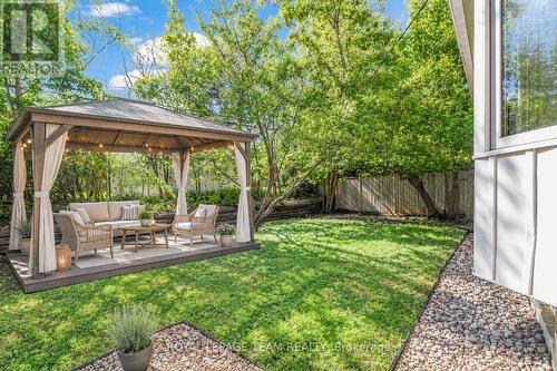 Photo has been virtually staged - 2317 Elmira Drive, Ottawa, ON - Outdoor With Backyard
