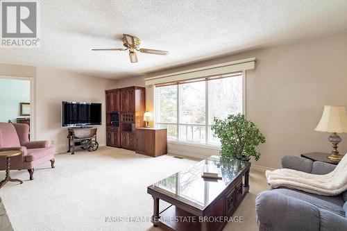 21 Pooles Road, Springwater, ON - Indoor Photo Showing Living Room
