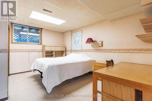 21 Pooles Road, Springwater, ON - Indoor Photo Showing Bedroom