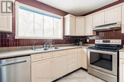21 Pooles Road, Springwater, ON - Indoor Photo Showing Kitchen With Double Sink