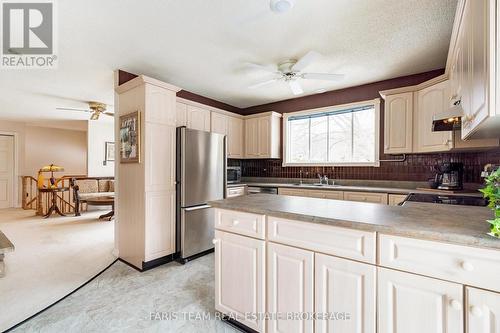 21 Pooles Road, Springwater, ON - Indoor Photo Showing Kitchen With Double Sink