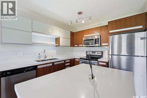 427 1303 Paton Crescent, Saskatoon, SK - Indoor Photo Showing Kitchen With Stainless Steel Kitchen With Double Sink With Upgraded Kitchen