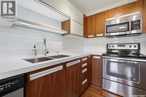 427 1303 Paton Crescent, Saskatoon, SK - Indoor Photo Showing Kitchen With Stainless Steel Kitchen With Double Sink With Upgraded Kitchen