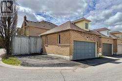 Double Car Garage With Parking Pad - 