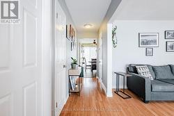 Hallway view from living room to back of house - 