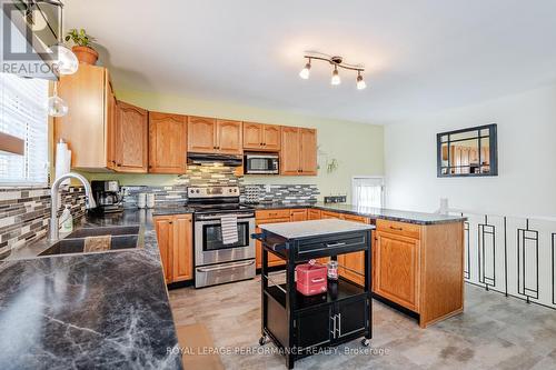 Bright kitchen - 3301 Ross Avenue, Cornwall, ON - Indoor Photo Showing Kitchen With Double Sink