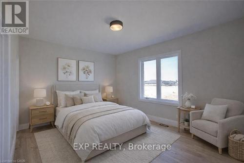 Virtually staged for illustrative purposes - 97 Bedell Drive, Mapleton, ON - Indoor Photo Showing Bedroom