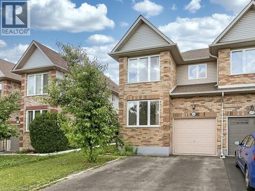 Brick and siding exterior featuring gabled roofs and multiple windows - 1310 Blanshard Drive, Burlington, ON - Outdoor With Facade