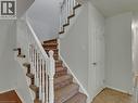 Carpeted staircase with white balusters and handrail - 1310 Blanshard Drive, Burlington, ON  - Indoor Photo Showing Other Room 