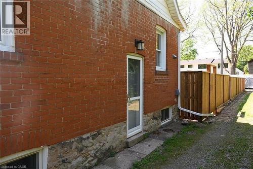 Brick exterior with a stone foundation - 304 Park Street, Dundas, ON - Outdoor With Exterior