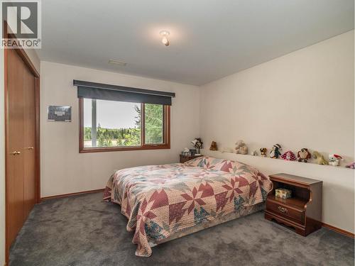 7497 Little Fort 24 Highway, Bridge Lake, BC - Indoor Photo Showing Bedroom