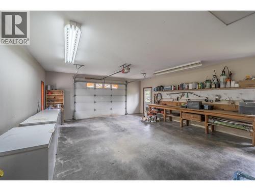 7497 Little Fort 24 Highway, Bridge Lake, BC - Indoor Photo Showing Garage