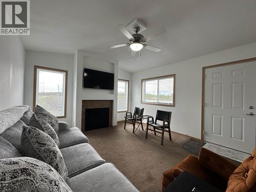 2510 North Bonaparte Road, 70 Mile House, BC - Indoor Photo Showing Living Room With Fireplace