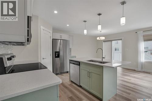 503 Schmeiser Avenue, Saskatoon, SK - Indoor Photo Showing Kitchen With Stainless Steel Kitchen With Double Sink With Upgraded Kitchen