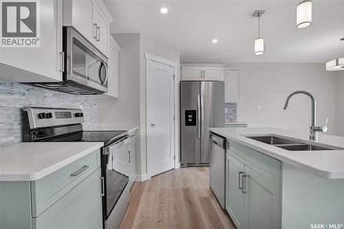 503 Schmeiser Avenue, Saskatoon, SK - Indoor Photo Showing Kitchen With Stainless Steel Kitchen With Double Sink With Upgraded Kitchen
