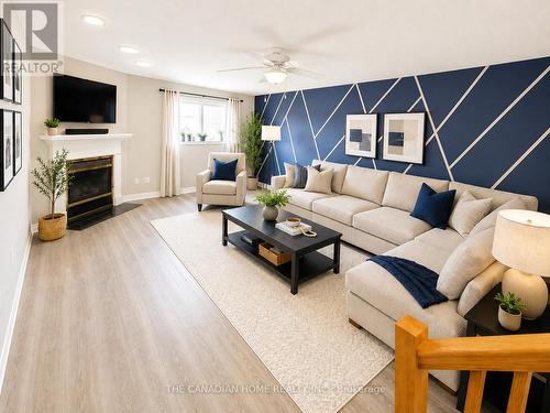 2842 Meadowgate Boulevard, London South, ON - Indoor Photo Showing Living Room With Fireplace
