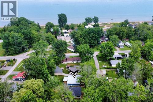 Aerial perspective showcasing the property's proximity to a body of water with a sandy shore - 5 Ralph Street, Turkey Point, ON - Outdoor With View