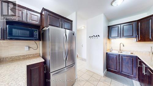 115 - 1055 A Forestwood Drive, Mississauga, ON - Indoor Photo Showing Kitchen With Double Sink