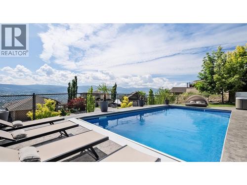 593 Harrogate Lane, Kelowna, BC - Outdoor With In Ground Pool