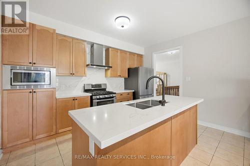 52 Atchison Drive, Caledon, ON - Indoor Photo Showing Kitchen With Double Sink