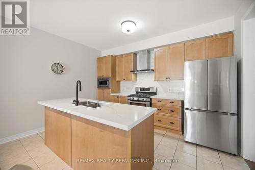 52 Atchison Drive, Caledon, ON - Indoor Photo Showing Kitchen With Double Sink